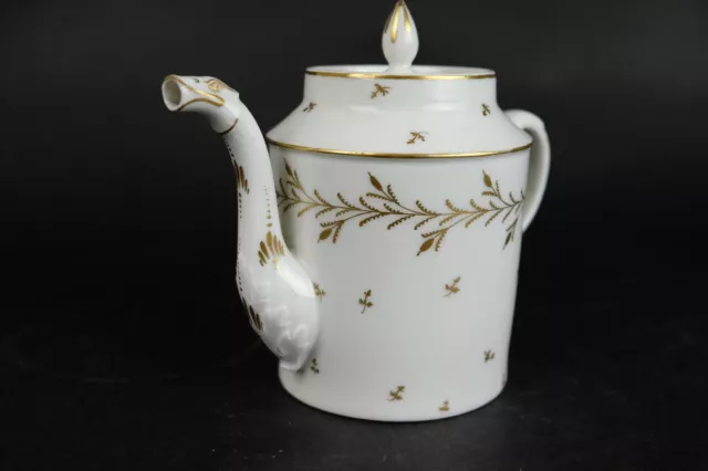 French 19th century Gilt Porcelain Teapot with raised maskerons,