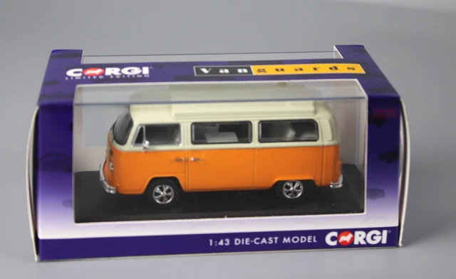 A restored blue Volkswagen VW Type 2 Bay Window Camper Van at a vintage