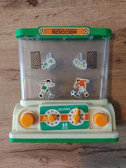 JEU D'EAU TOMY - WATER GAME - DINO WORLD