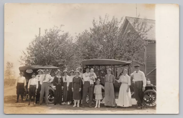 Postcard RPPC Large Group of People Posing in Front of cars c1920
