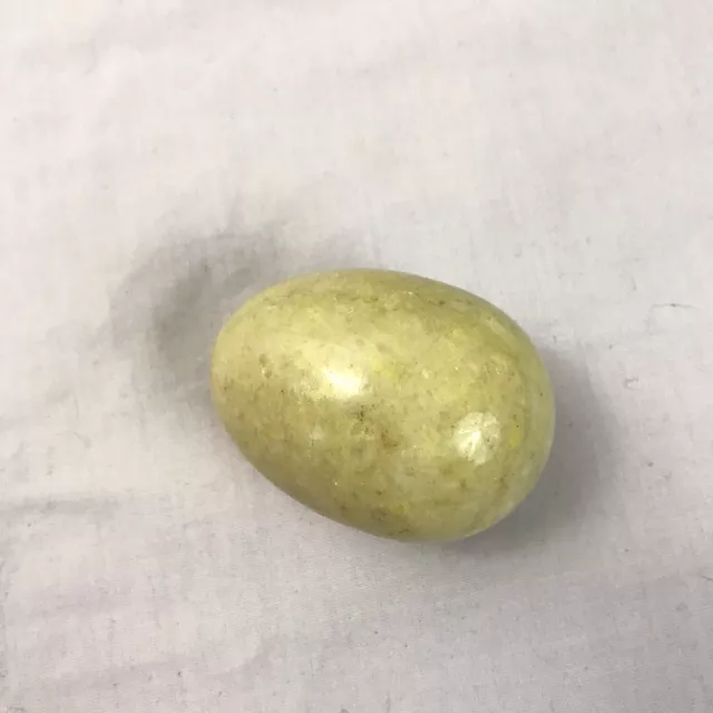 polished stone alabaster egg dark yellow sparkle 3in