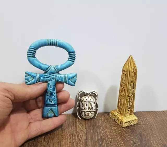 Ancient Egyptian amulets of the scarab beetle, the obelisk, and the key to life 2