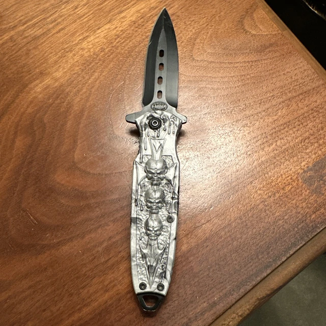 Frost Cutlery Skull Pocket Knife w/silver & Black Raised 3D Skulls Handle Design