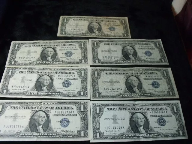 7 One Dollar  Notes $1 Silver Certificate Bill Blue Seal 4-1957 inc. A STAR NOTE