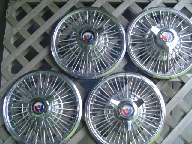 1966 mustang store spinner hubcaps