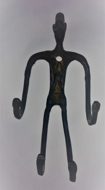 An Old Brass Made Coat Hook Having Four Hooks Showing A Trible Man (India)