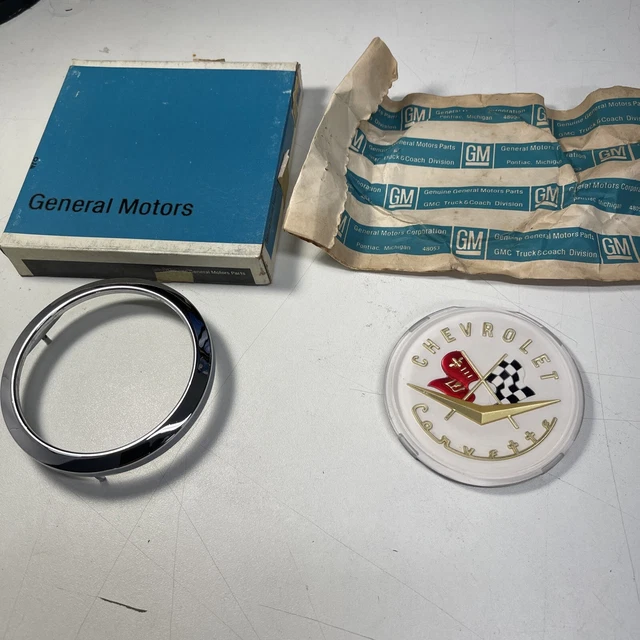NOS GM￼ 1956-57 Corvette ￼Emblem and Bezel 3725755  3725754 Very nice