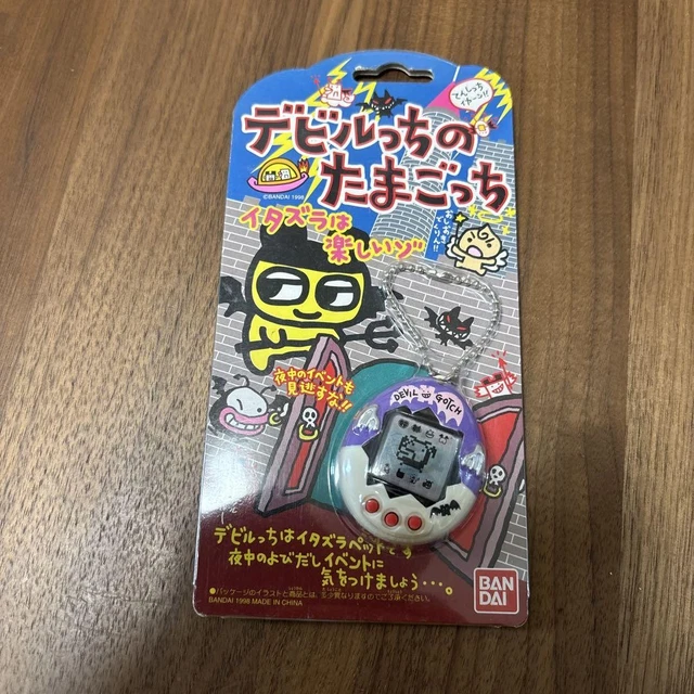TAMAGOTCHI DEVILGOTCHI DEVILTCHI Versión Devil White Bandai de