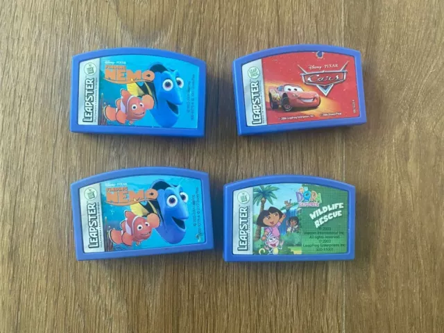 Lot of 4 Leapster Cartridges - Nemo, Dora, Cars - Excellent