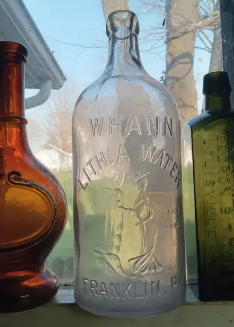 WHANN LITHIA WATER FRANKLIN,PA EMB WOMAN AT SPRINGS 1890s BLOB TOP BOTTLE