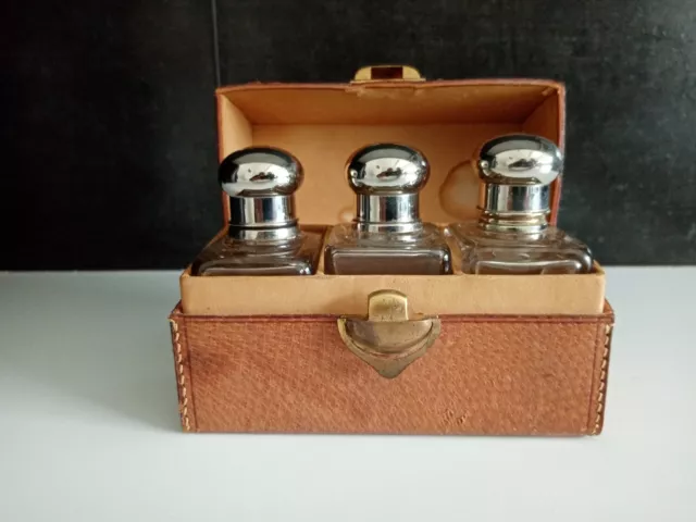 Mens vintage leather toiletry case with bottles