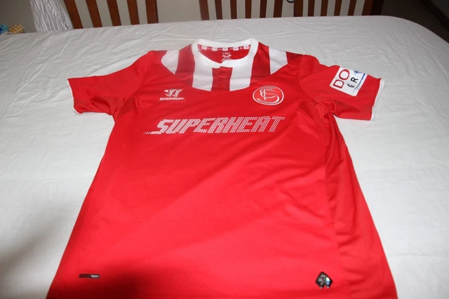 CAMISETA OFICIAL DEL SEVILLA FC DE LA MARCA WARRIOR TALLA L MUY