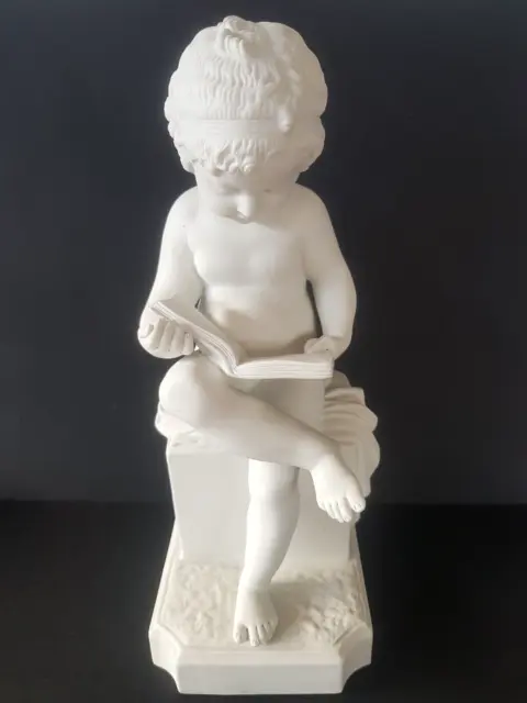 Biscuit, porcelaine, statuette de l'enfant à l'étude d'après Canova.