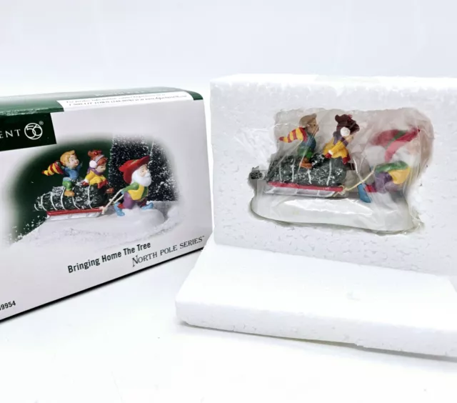 Dept 56 Bringing Home The Tree Accessory North Pole Series Mint in Box MIB