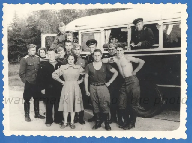 Girls and guys at the old bus Military Naked torso Vintage photo