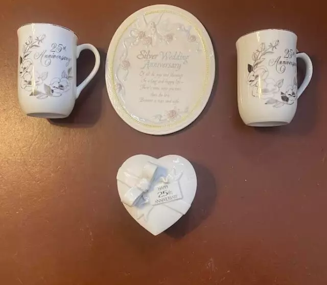 5 piece 25th anniversary set.   Excellent shape