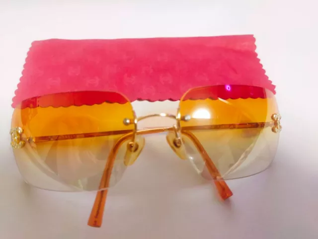 CHANEL CC COCO Logos Orange Gold Rhinestone Rimless Sunglasses