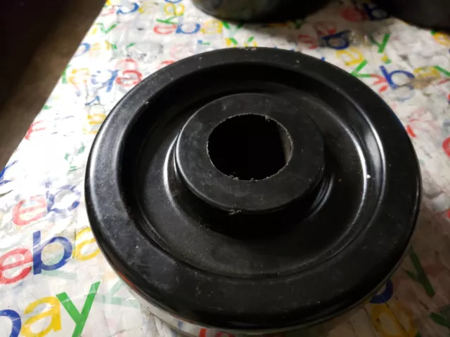 7 3/4" OD. Caster Wheels,1.935 ID. 3 1/4" Wide, Black Hard Plastic