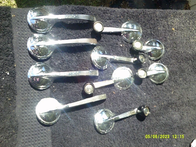 1955-57 CHEVY INTERIOR window cranks and door handle set. used $45.00