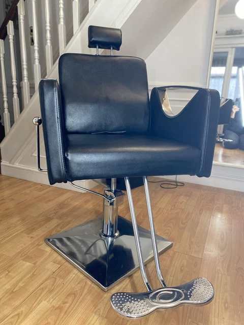 Height adjustable and 360° swivel hairdressers chair. Used and good condition