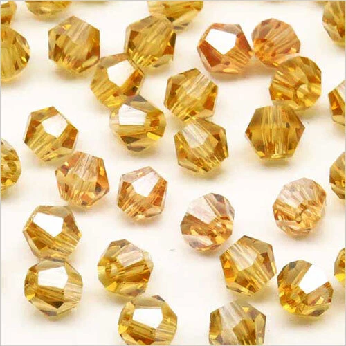 Lot de 40 Perles Tchèques Toupies en Cristal 4mm Topaze Clair