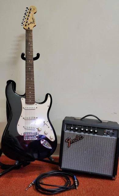 Fender Squier Guitar with Fender Frontman 15g Amp, Guitar Stand and Cables. Fender Squier Guitar with Fender Frontman 15g Amp, Guitar Stand and Cables.