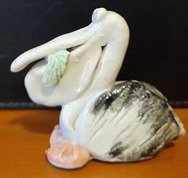 Miniature pelican figurine, hand made pottery, glazed, signed