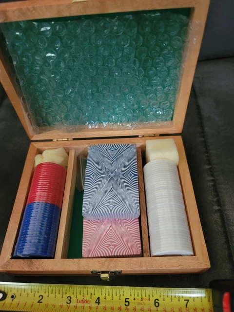 Poker Chip set with wood case, 5 dice and 2 decks. Contents still in plastic.