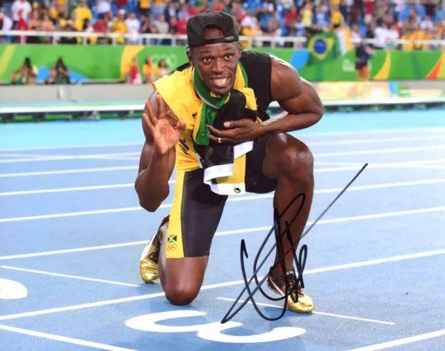 Usain Bolt Signed 10x8 Photo Athletics AFTAL#217 OnlineCOA