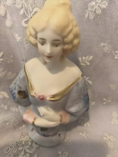 Repro porcelain half doll "Jemima" 10cms painted in blue with decals.