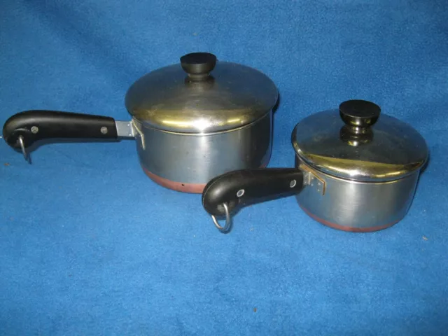 Two Revere Ware sauce pans with lids.  Pre 1968 double ring