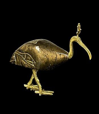 Fantastic Bird IBIS god of knowledge (THOTH) with the lotus flower