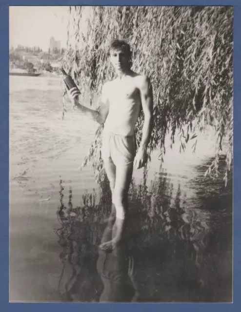 Shirtless guy in swim trunks, bare torso bulges muscles, bare feet Vintage Photo