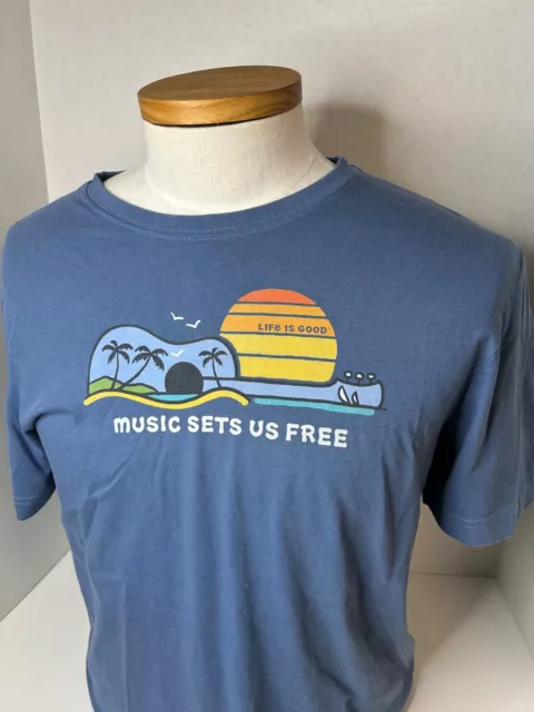 Life is Good Men Medium Crusher Lite Tee Music Sets Us Free Blue T Shirt Guitar