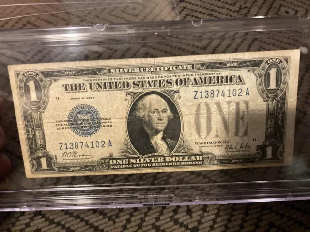 1928 B One Dollar Funny Back Silver Certificate Blue Seal. Crisp $1 Note.