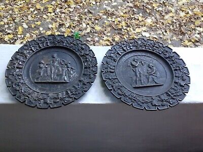 Lot of two old collectible cast iron wall plates
