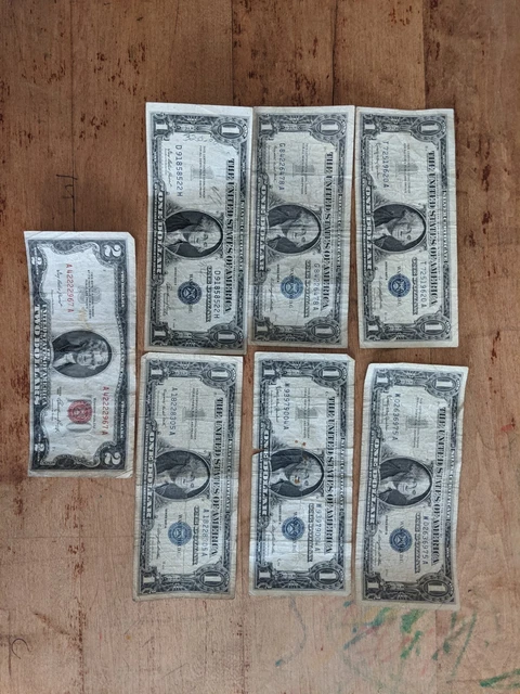 Silver Certificate Lot Of 7. Miscut Red Seal $2, 6 Blue Seal $1. All Circulated