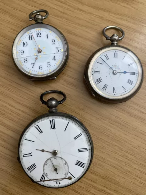 Three antique solid silver cased fob pocket watches