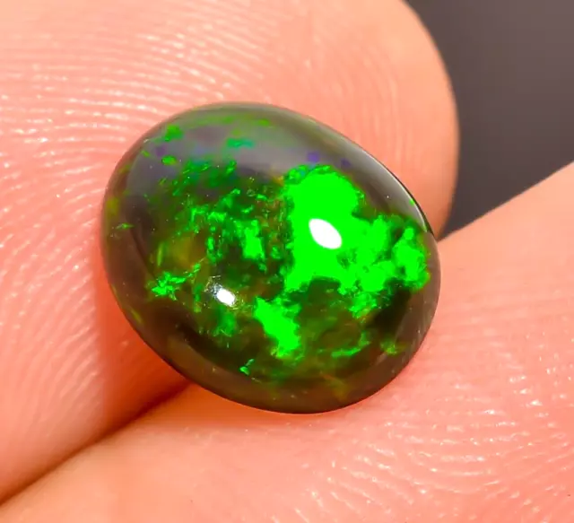 Natural Black Ethiopian Opal Oval Shape Fire Play Opal Gemstone 1.6 Ct 9X7X3 mm