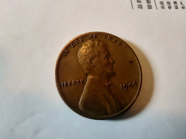 1944 wheat penny no mint mark error-L in Rim