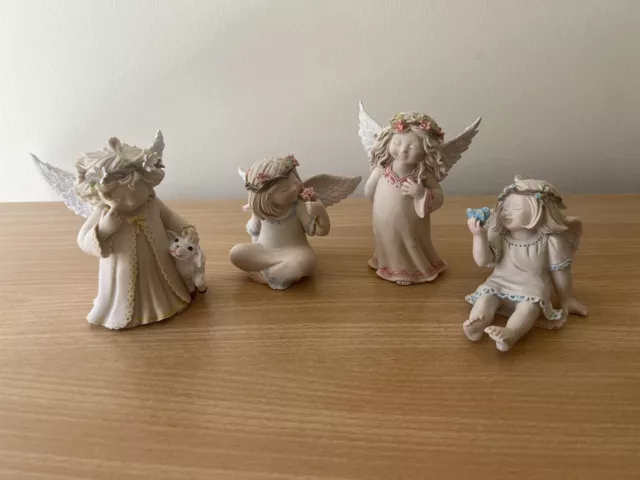 Four Little Blessings by Kathleen Morris Seagull Studios Figurines