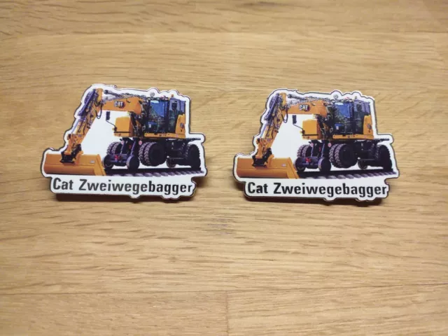 2 x ZEPPELIN CAT Zweiwegebagger PIN von der bauma