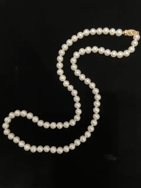 Vintage Hand Knotted Pearl Necklace  with a 14K Gold Clasps