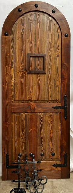 Rustic reclaimed lumber arched door solid wood storybook castle winery speakeasy