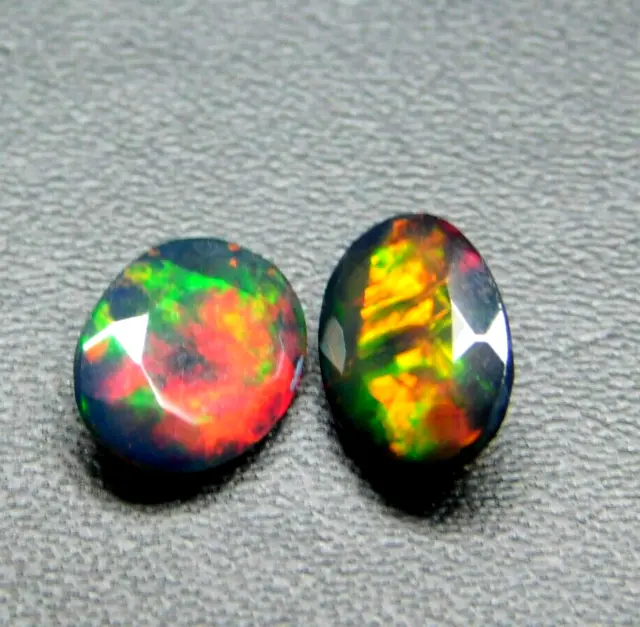 Natural Faceted Black Ethiopian Opal Pair Flashy Multi Fire 9x7 MM Oval Cut opal