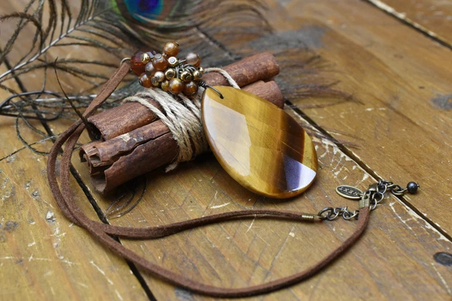 faceted tigers eye teardrop pendant , leather thong necklace , next