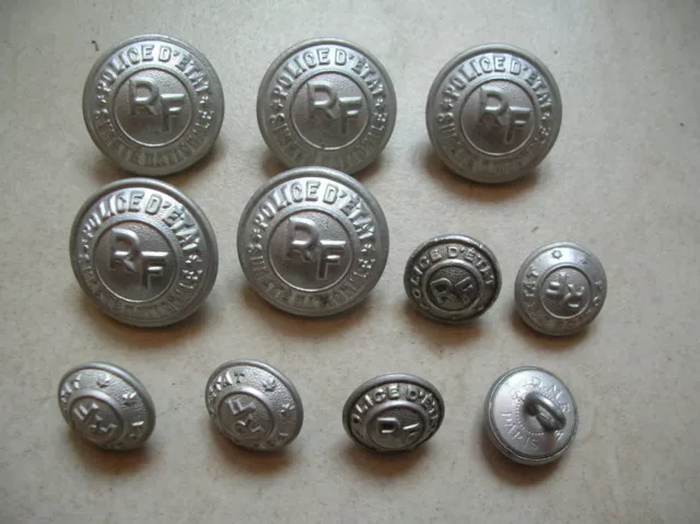 Lot de 11 anciens boutons de la police sûreté nationale en alu WWII