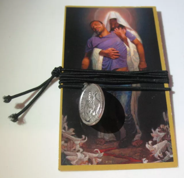 St Francis St Claire Reversable Pendant on Elastic Cord on Original Card