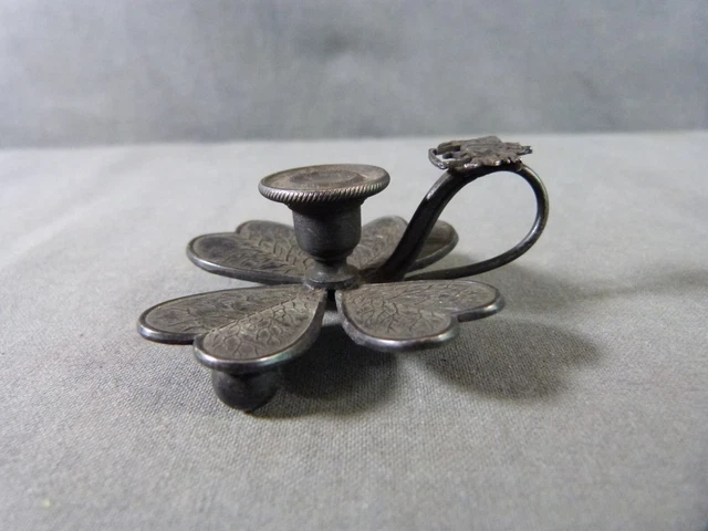 Four-leaf clover-shaped silver incense-holder featuring Joan of Arc on horseback