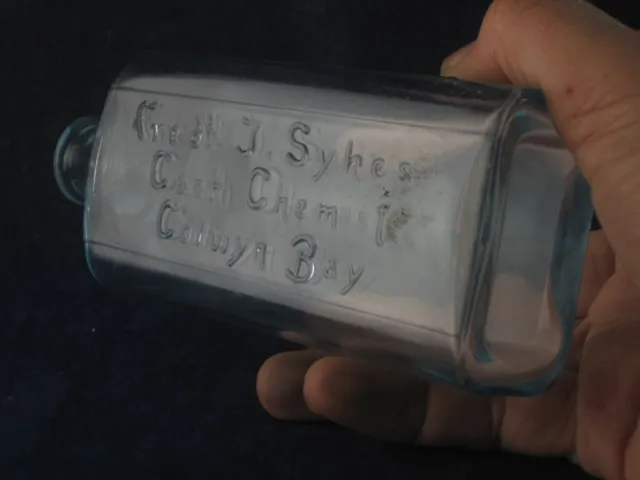 54547 Old Vintage Antique Glass Bottle Chemist Medicine Cure Sykes Colwyn Bay